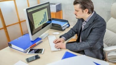 young businessman working from his office 181624 24379