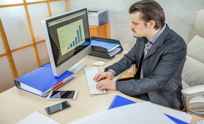 young businessman working from his office 181624 24379