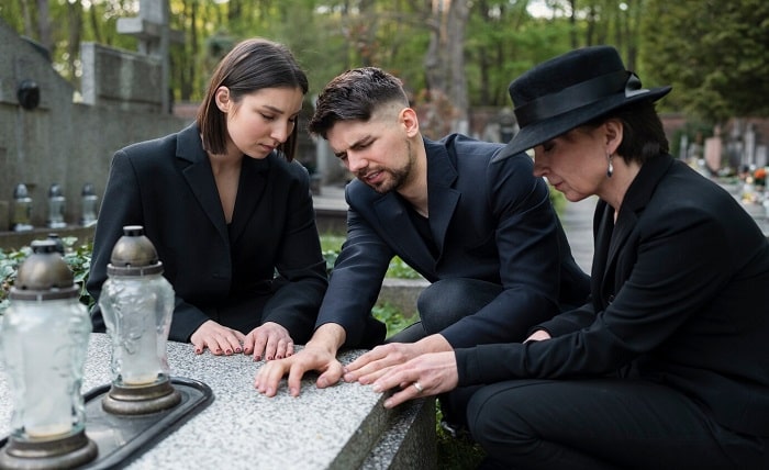 mourning family together cemetery 23 2149435489