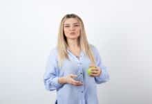 portrait pretty girl model standing holding green fresh apple 114579 74378