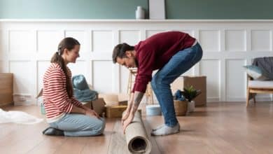 young couple moving into new home 23 2149199041