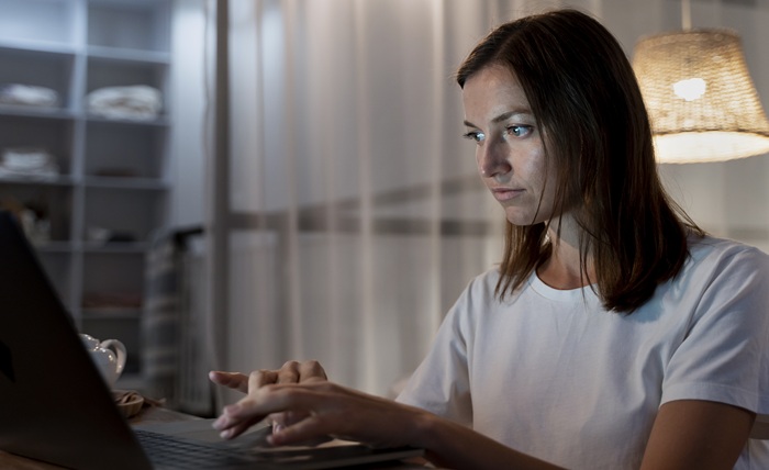 close up person working home night