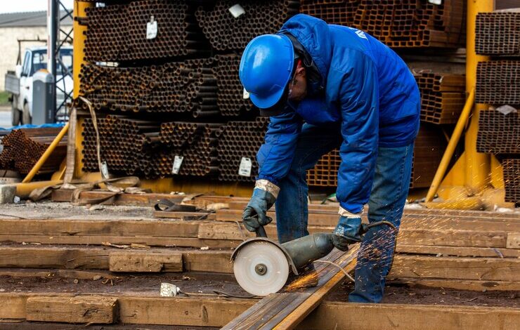 worker cuts iron with tool 140725 7623